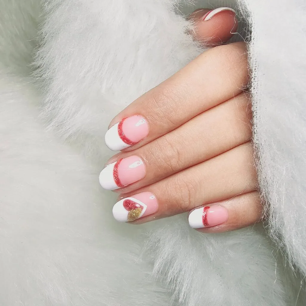 Elegant white and pink glitter French tip nail design